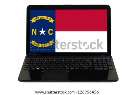 notebook computer with flag of us state of north carolina