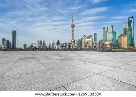empty square and city skyline under blue sky, shanghai city, china.
