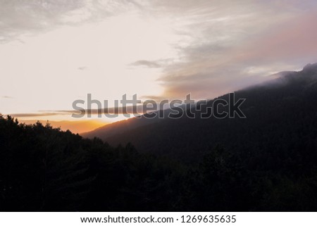 Stunning sunset between mountains