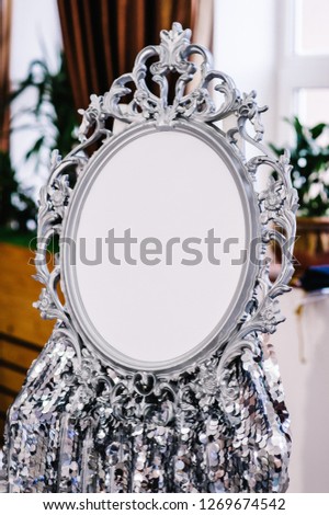 Baroque silver picture frame. Vintage style mockup with space for your picture or text. Frame with blank space on wedding.