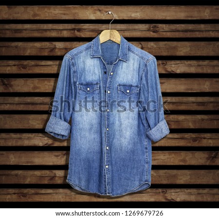 blue shirt mockup and template for textile and fashion design. blank wood background vintage style