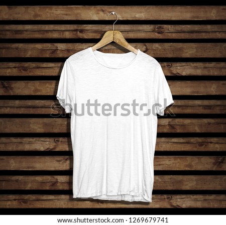 Download Blank White T Shirt Template Mockup On Wood Background Stock Photos And Images Avopix Com