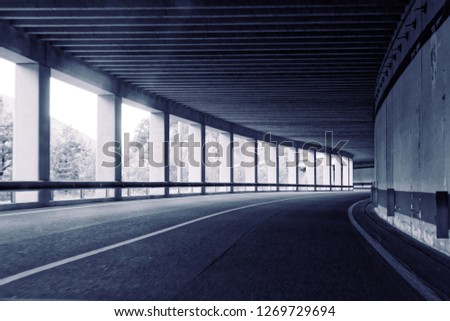the car is moving rapidly through the tunnel. unsharply blurred. Royalty-Free Stock Photo #1269729694