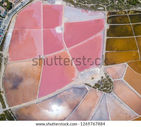 Earth's line. A drone vertical perspective of the ground's colors and shapes. Salt flats at Colonia de Sant Jordi, Ses Salines, Mallorca, Spain