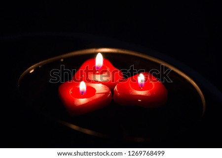 Red heart candles in the Red heart shaped bowl.
