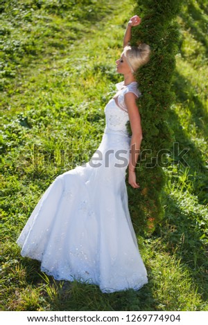 Portrait of bride on the grass background