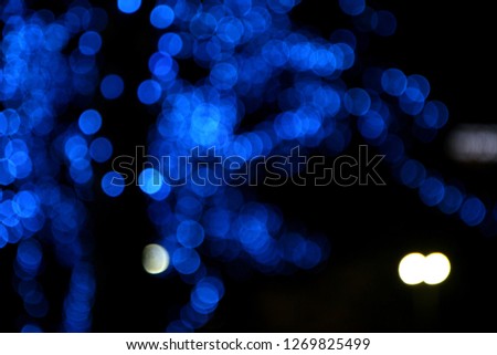 Christmas and New Year feast bokeh background with copyspace. Holiday party background with blurry boke special magic effect