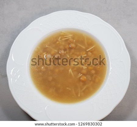 
Cooked soup with chickpeas and noodles