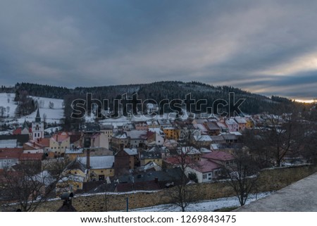 Vimperk town in cold winter evening in sunset time with snow and ice