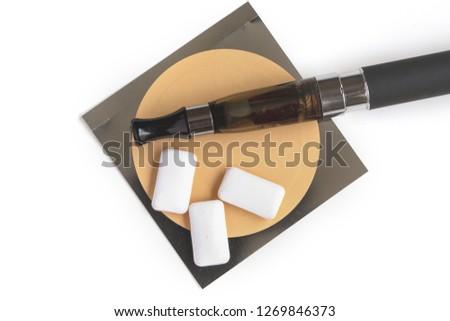 nicotine patch, chewin gum and ecigarette used for smoking cessation isolated on white background Royalty-Free Stock Photo #1269846373