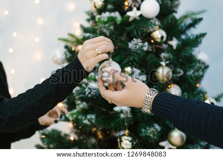 girl gives guy a toy for my christmas tree
