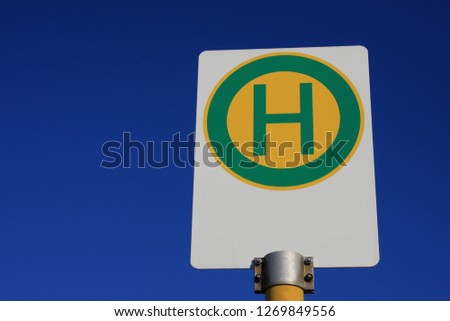 Shield stop with the sign "H"