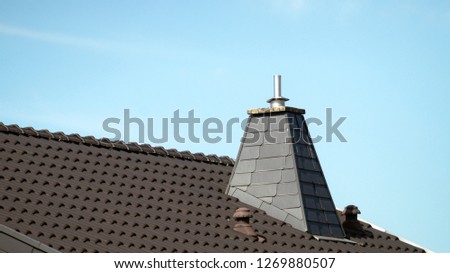 
house roof with fireplace cladding