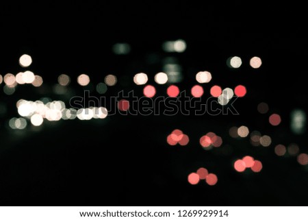 Out of focus traffic, defocus light background.  Colorful blurred background.