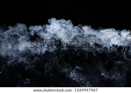 A thick blue tinted smoke textured overlay pattern over a black background.