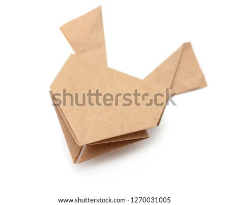 Origami frog on white