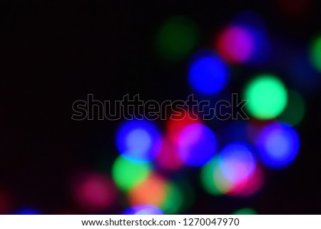 Beautiful colorful blurry lighting effect with dark background