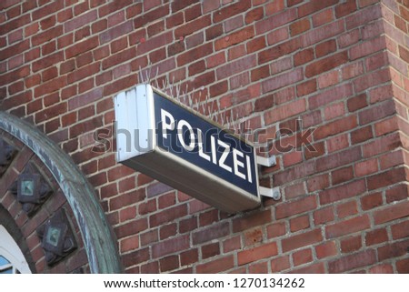 Shield "police" at a guard