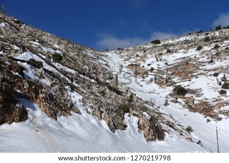 Winter photo of famous Parnitha mountain covered up in snow, Attica, Greece