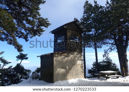 Winter photo from lookout station in famous Parnitha mountain covered up in snow, Attica, Greece