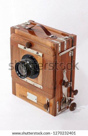 Old vintage black camera with cliping path on white. Retro photocamera.