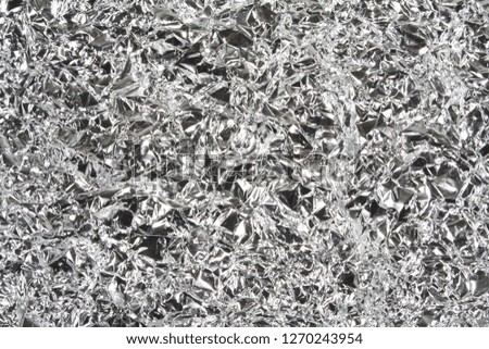 crumpled metal isolated on white background