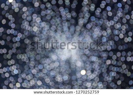 Abstract bokeh background. Winter decorations, at night.