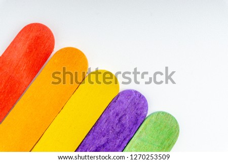 Colorful wooden stick with selective focus and crop fragment. Business and education concept