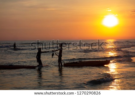 People activities at the beach in sundown