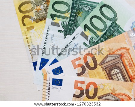 Euro banknotes on white background. Cash money. Savings