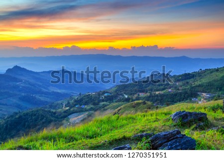 Landscape of sunset on Mountain at Doi Pha Tang, ChiangRai ,Thailand Royalty-Free Stock Photo #1270351951