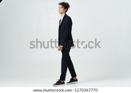 Male businessman on a white background, full length