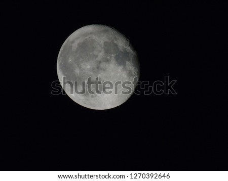 Epic celestial body, full moon in a dark night