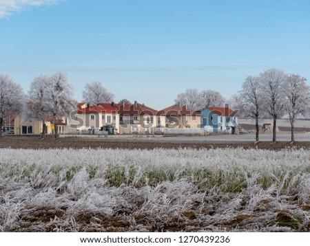 Image of romantic winter landscape with village