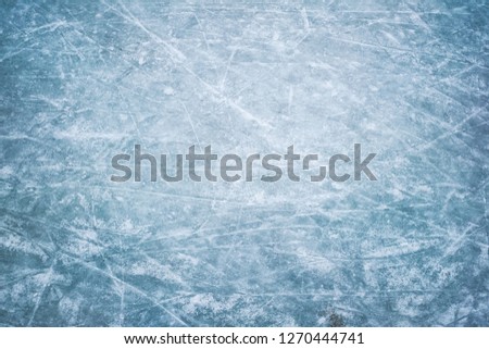 Blue ice in skate scratches Royalty-Free Stock Photo #1270444741