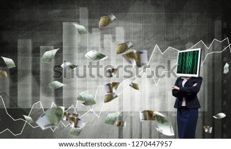 Business woman in suit with monitor instead of head keeping arms crossed while standing against flying euro banknotes and analytical charts drawn on wall on background. 3D rendering.