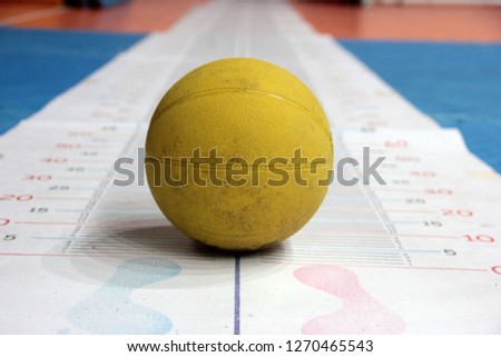 yellow throwing ball