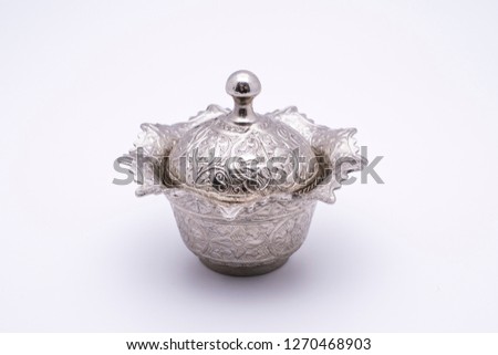 embroidered metal bowl.   Traditional Embossed Metal bowl on. Ottoman and Turkish bowl on white background
