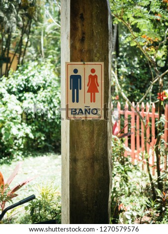 Spanish sign for bathroom in Puerto Viejo, Costa Rica while on a Caribbean vacation.