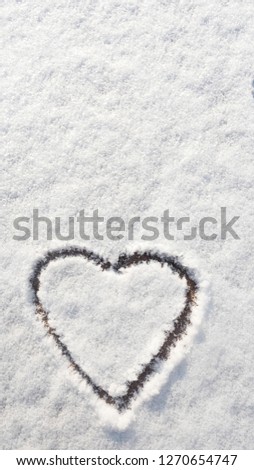 Draw a heart on the snow