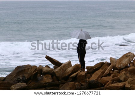 umbrella on the beach from rain and sun