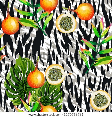Seamless pattern with tropical leaves and fruits and stripes of a tiger.