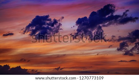 Beautiful sky with clouds. Beautiful morning or evening colorful stormy and stormy sky at sunset or sunrise with clouds.