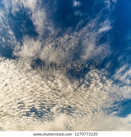 Beautiful sky with clouds. Beautiful daytime and bright blue and ultramarine sky with clouds.