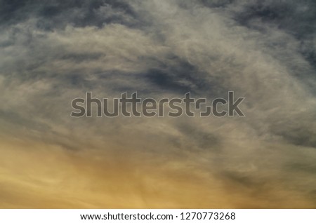 Beautiful sky with clouds. Beautiful morning or evening colorful stormy and stormy sky at sunset or sunrise with clouds.