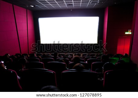 Cinema auditorium with screen and seats