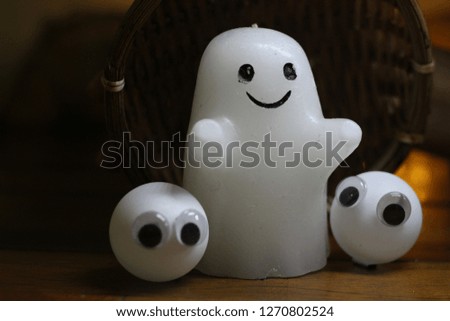 Halloween concept. Cute little ghost figure. scary moments.