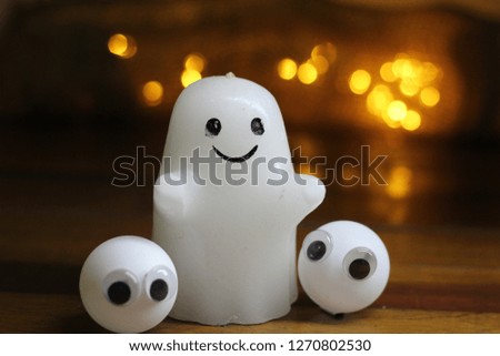Halloween concept. Cute little ghost figure. scary moments.