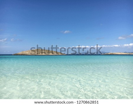 A splendid view of the turquoise water in front of the Platja d’Illetes, Formentera island, Spain.