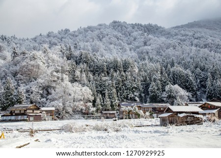 Shirakawa-go village during snowing in winter, with traditional House Gassho style and one of UNESCO world heritage sites, Gifu, Japan